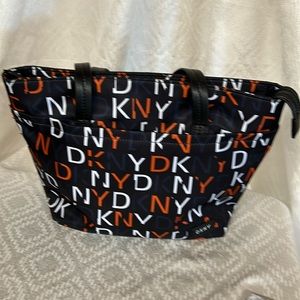 DNKY Shoulder Bag . DKNY Letters printed all over the bag .NEW